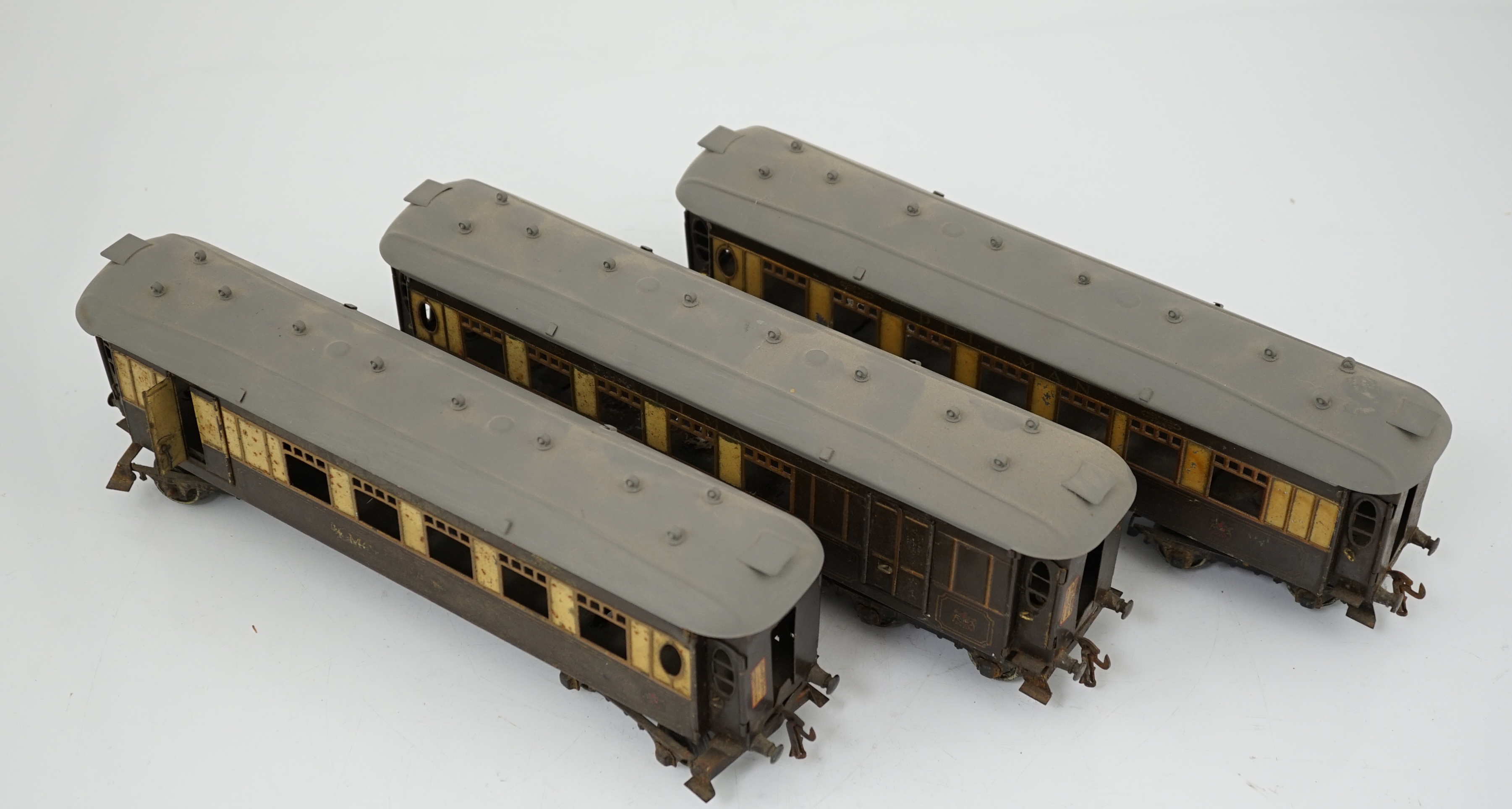 Three Hornby Series 0 gauge tinplate Pullman cars; Loraine, Arcadia and Montana
